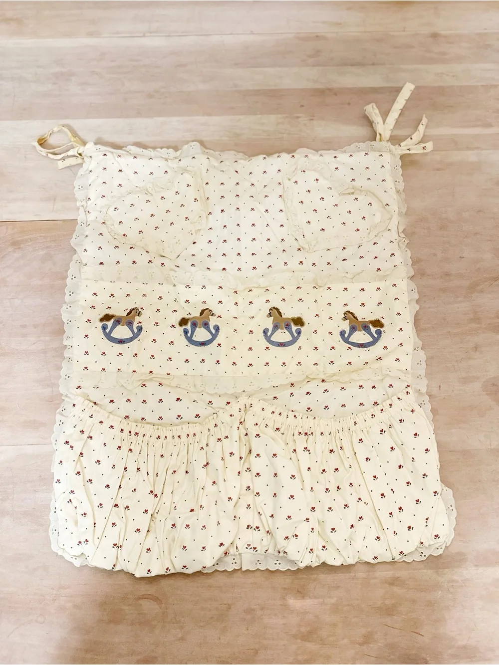 Nursery crib skirt and organizer